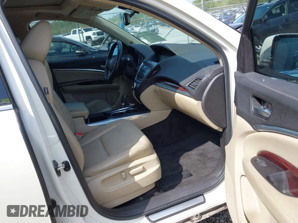 2014 Acura MDX with VIN 5FRYD3H25EB016572, listed as a IAAI auction lot 41924701 with 121,346 mi miles and . Bid and sale history available at DreamBid. Image 5.