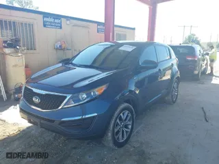 2014 Kia Sportage LX with VIN KNDPBCAC4E7586798, listed as a IAAI auction lot 41671198 with 137405 miles. Bid and sale history available at carsss.com. Image 2.