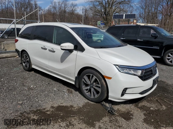 2021 Honda Odyssey Touring with VIN 5FNRL6H85MB008260, listed as a Copart auction lot 49244845 with 58,570 mi miles and Salvage Title. Bid and sale history available at carsss.com. Image 4.
