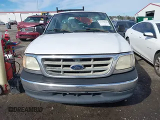 2001 Ford F-150 XL with VIN 3FTZF172X1MA58618, listed as a IAAI auction lot 41598020 with Not provided miles and . Bid and sale history available at DreamBid. Image 12.
