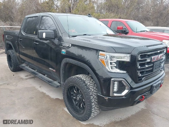 2019 GMC Sierra 1500 AT4 with VIN 1GTP9EEDXKZ144019, listed as a IAAI auction lot 41598034 with 106,046 mi miles. Bid and sale history available at carsss.com. Image 1.