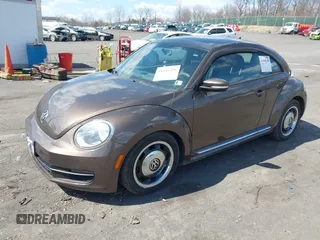 2013 Volkswagen Beetle 2.5L с VIN 3VWJP7AT1DM601306, выставлен на аукционе IAAI как лот 41846490 с пробегом 117 082 миль миль и . История ставок и продаж доступна на DreamBid. Изображение 2.