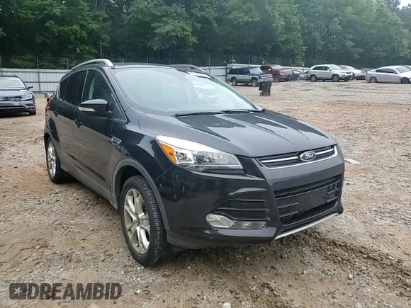 2015 Ford Escape Titanium with VIN 1FMCU0J96FUC00683, listed as a Copart auction lot 58345105 with 61,031 mi miles and Salvage title. Bid and sale history available at DreamBid. Image 14.