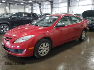 2009 Mazda 6 i Sport with VIN 1YVHP81A195M42784, listed as a Copart auction lot 57099585 with 105,725 mi miles and Salvage title. Bid and sale history available at DreamBid. Image 1.