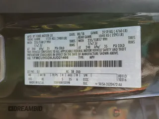 2018 Ford Escape SE z VIN 1FMCU9GDXJUD21466, wystawiony jako Copart lot #46266395 z przebiegiem Nie podano mil oraz Szkoda całkowita • Salvage title. Historia ofert i sprzedaży dostępna na DreamBid. Obrazek 13.