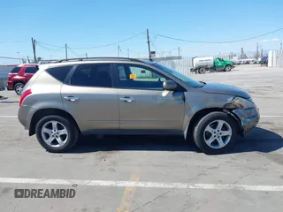 2004 Nissan Murano SL z VIN JN8AZ08T94W204232, wystawiony jako IAAI lot #42239543 z przebiegiem Nie podano mil oraz . Historia ofert i sprzedaży dostępna na DreamBid. Obrazek 12.