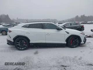 2019 Lamborghini Urus z VIN ZPBUA1ZL0KLA02164, wystawiony jako IAAI lot #41108311 z przebiegiem Nie podano mil oraz . Historia ofert i sprzedaży dostępna na DreamBid. Obrazek 13.