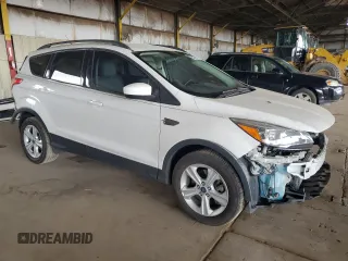 2015 Ford Escape SE with VIN 1FMCU9GX2FUB49175, listed as a Copart auction lot 54582125 with 90,544 mi miles and Salvage Title. Bid and sale history available at DreamBid. Image 4.