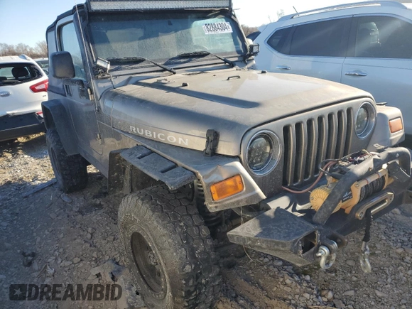 2004 Jeep Wrangler Rubicon with VIN 1J4FA69S94P778836, listed as a Copart auction lot 82884304 with 168,045 mi miles and Salvage Title. Bid and sale history available at carsss.com. Image 4.