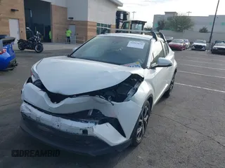 2019 Toyota C-HR XLE with VIN JTNKHMBX4K1040772, listed as a IAAI auction lot 41812031 with 79,729 mi miles. Bid and sale history available at carsss.com. Image 6.