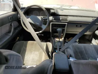 1990 Toyota Camry LE ECT z VIN JT2SV22E0L0351440, wystawiony jako Copart lot #70768614 z przebiegiem 176 239 mil mil oraz Szkoda całkowita • Salvage title. Historia ofert i sprzedaży dostępna na DreamBid. Obrazek 8.