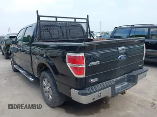 2012 Ford F-150 XL with VIN 1FTFW1CF3CFA85240, listed as a IAAI auction lot 41809630 with 220,199 mi miles. Bid and sale history available at carsss.com. Image 3.