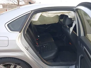 2016 Volkswagen Passat 1.8T SEL with VIN 1VWCT7A3XGC018484, listed as a IAAI auction lot 41763388 with 123,484 mi miles. Bid and sale history available at carsss.com. Image 8.