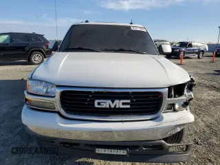 2005 GMC Yukon SLT z VIN 1GKEC13T75R205508, wystawiony jako Copart lot #87511845 z przebiegiem 179 749 mil mil oraz Szkoda całkowita • Salvage title. Historia ofert i sprzedaży dostępna na DreamBid. Obrazek 5.