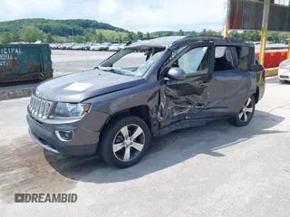 2016 Jeep Compass High Altitude Edition with VIN 1C4NJDEB0GD558230, listed as a IAAI auction lot 39799941 with 57,002 mi miles. Bid and sale history available at carsss.com. Image 2.