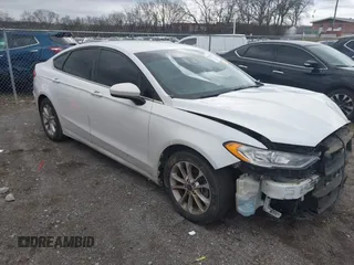 2019 Ford Fusion SE with VIN 3FA6P0HD4KR246815, listed as a IAAI auction lot 41214573 with 127,386 mi miles. Bid and sale history available at carsss.com. Image 1.