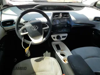 2018 Toyota Prius Two z VIN JTDKARFU0J3054693, wystawiony jako Copart lot #57581855 z przebiegiem 51 684 mil mil oraz Szkoda całkowita • Salvage title. Historia ofert i sprzedaży dostępna na DreamBid. Obrazek 8.