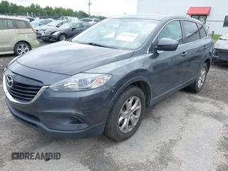 2014 Mazda CX-9 Touring z VIN JM3TB2CAXE0445450, wystawiony jako IAAI lot #42477260 z przebiegiem 139 583 mil mil oraz . Historia ofert i sprzedaży dostępna na DreamBid. Obrazek 2.