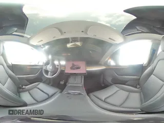 2024 Tesla Model Y Long Range с VIN 7SAYGDEE7RA279293, выставлен на аукционе Copart как лот 62758065 с пробегом 23 271 миль миль и Списание • Salvage title. История ставок и продаж доступна на DreamBid. Изображение 14.