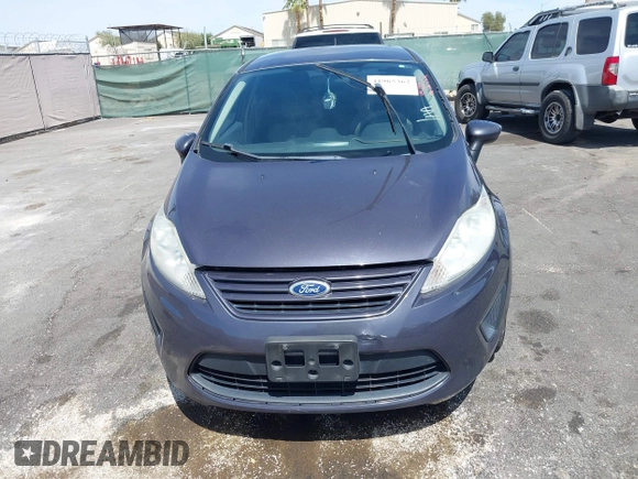 2012 Ford Fiesta S with VIN 3FADP4AJ4CM187553, listed as a IAAI auction lot 41965362 with 136,021 mi miles. Bid and sale history available at carsss.com. Image 6.