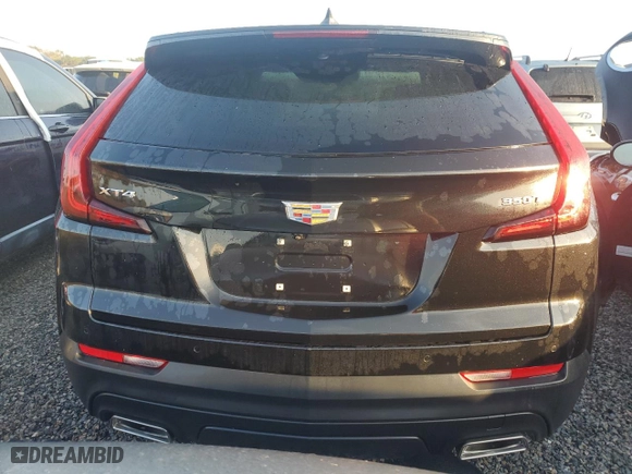 2022 Cadillac XT4 FWD Luxury with VIN 1GYAZAR40NF144779, listed as a Copart auction lot 75912804 with 9,805 mi miles and Non Repairable. Bid and sale history available at carsss.com. Image 6.