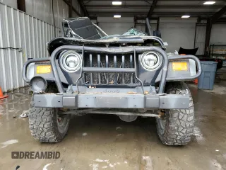 2006 Jeep Wrangler Sport z VIN 1J4FA49SX6P718734, wystawiony jako Copart lot #56516095 z przebiegiem 127 184 mil mil oraz Szkoda całkowita • Salvage title. Historia ofert i sprzedaży dostępna na DreamBid. Obrazek 5.