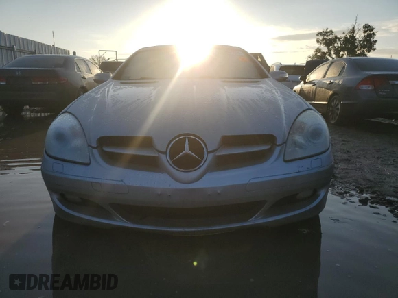 2005 Mercedes-Benz SLK-Class with VIN WDBWK56FX5F060562, listed as a Copart auction lot 73662754 with 0 mi miles and Salvage Title. Bid and sale history available at carsss.com. Image 5.