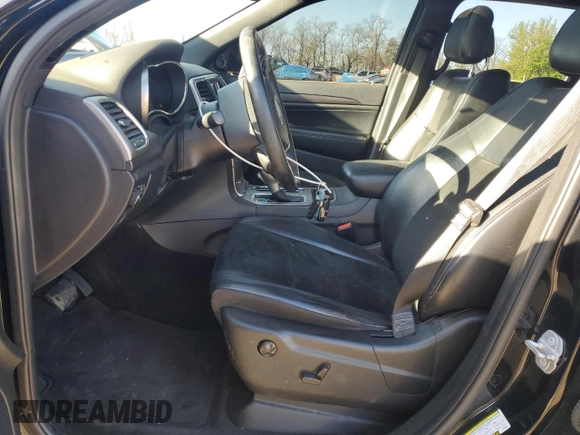 2018 Jeep Grand Cherokee Altitude with VIN 1C4RJFAGXJC296051, listed as a Copart auction lot 53450135 with 65,838 mi miles and Salvage title. Bid and sale history available at DreamBid. Image 7.