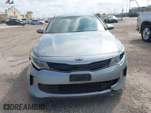 2017 Kia Optima with VIN KNAGT4LE6H5009057, listed as a IAAI auction lot 42521270 with 129,853 mi miles and . Bid and sale history available at DreamBid. Image 12.