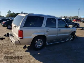 2004 Cadillac Escalade z VIN 1GYEC63T04R107597, wystawiony jako Copart lot #87259974 z przebiegiem Nie podano mil oraz Nie do naprawy • Non repairable. Historia ofert i sprzedaży dostępna na DreamBid. Obrazek 3.
