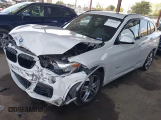2018 BMW X1 xDrive28i with VIN WBXHT3C36J5K26486, listed as a IAAI auction lot 41839817 with 65,835 mi miles. Bid and sale history available at carsss.com. Image 2.