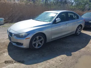 2013 BMW 3 Series 328i with VIN WBA3C1G52DNR44660, listed as a IAAI auction lot 41994277 with 165,151 mi miles and . Bid and sale history available at carsss.com. Image 2.