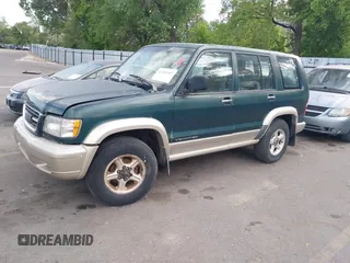 1999 Isuzu Trooper S z VIN JACDJ58X6X7922527, wystawiony jako IAAI lot #42461607 z przebiegiem 171 888 mil mil oraz . Historia ofert i sprzedaży dostępna na DreamBid. Obrazek 2.
