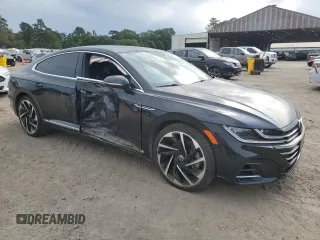 2023 Volkswagen Arteon SEL Premium R-Line with VIN WVWTR7AN4PE001607, listed as a Copart auction lot 57520055 with 42,705 mi miles and Salvage title. Bid and sale history available at DreamBid. Image 4.