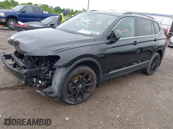 2018 Volkswagen Tiguan SEL with VIN 3VV3B7AXXJM090706, listed as a IAAI auction lot 42216046 with 147,249 mi miles and . Bid and sale history available at DreamBid. Image 2.