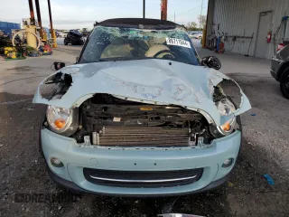 2012 MINI Convertible z VIN WMWZN3C59CT135351, wystawiony jako Copart lot #86711044 z przebiegiem 93 515 mil mil oraz Nie do naprawy • Non repairable. Historia ofert i sprzedaży dostępna na DreamBid. Obrazek 5.