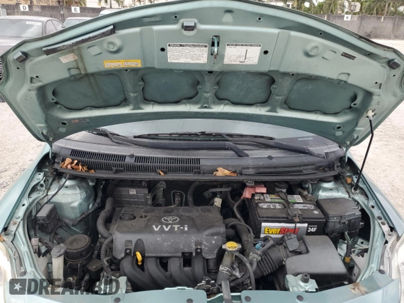 2007 Toyota Yaris with VIN JTDBT923271052472, listed as a Copart auction lot 50942975 with 147,363 mi miles and Salvage Title. Bid and sale history available at DreamBid. Image 11.