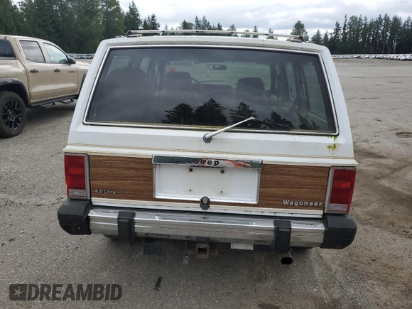 1990 Jeep Grand Wagoneer z VIN 1J4FN78L0LL282169, wystawiony jako Copart lot #59809545 z przebiegiem 194 382 mil mil oraz Czysty tytuł • Clean title. Historia ofert i sprzedaży dostępna na DreamBid. Obrazek 6.