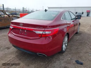 2016 Hyundai Azera Limited with VIN KMHFH4JG9GA555812, listed as a IAAI auction lot 41772140 with 103,027 mi miles. Bid and sale history available at carsss.com. Image 4.