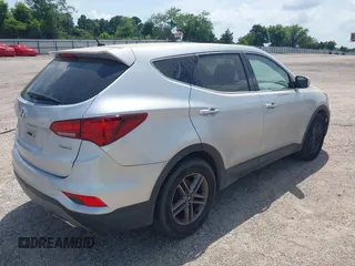 2018 Hyundai Santa Fe 2.4L with VIN 5XYZT3LB4JG557373, listed as a IAAI auction lot 42511741 with 142,572 mi miles and . Bid and sale history available at DreamBid. Image 4.