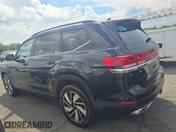 2024 Volkswagen Atlas SE with VIN 1V2HR2CA1RC579096, listed as a IAAI auction lot 42751185 with 15,477 mi miles and . Bid and sale history available at DreamBid. Image 6.
