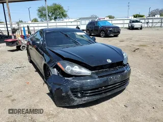2008 Hyundai Tiburon GT z VIN KMHHN66F18U295838, wystawiony jako Copart lot #51972325 z przebiegiem 147 626 mil mil oraz Szkoda całkowita • Salvage title. Historia ofert i sprzedaży dostępna na DreamBid. Obrazek 11.