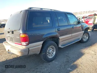 2000 Mercury Mountaineer with VIN 4M2ZU86P9YUJ20084, listed as a IAAI auction lot 41327042 with 182,253 mi miles and . Bid and sale history available at DreamBid. Image 4.