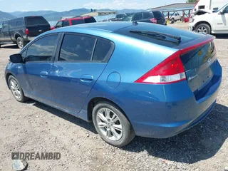 2010 Honda Insight EX with VIN JHMZE2H73AS014811, listed as a IAAI auction lot 42517559 with 173,579 mi miles and . Bid and sale history available at DreamBid. Image 3.