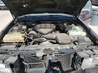 1995 Cadillac Fleetwood z VIN 1G6DW52P6SR702106, wystawiony jako Copart lot #48826215 z przebiegiem 140 971 mil mil oraz Szkoda całkowita • Salvage title. Historia ofert i sprzedaży dostępna na DreamBid. Obrazek 11.