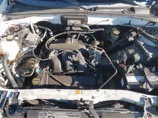 2002 Ford Escape XLT with VIN 1FMCU03112KC92704, listed as a IAAI auction lot 41807550 with 105,762 mi miles and . Bid and sale history available at DreamBid. Image 10.
