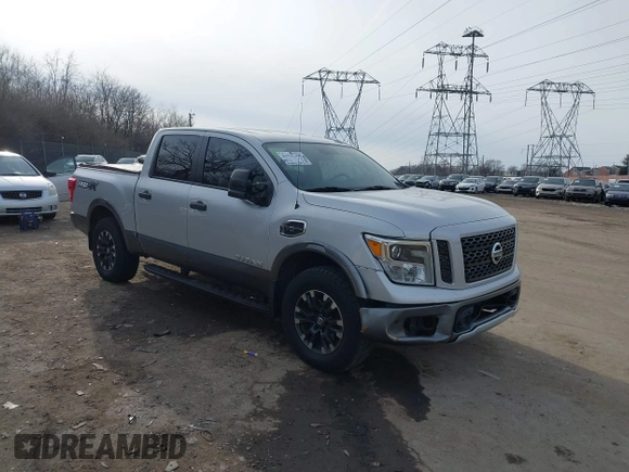 2017 Nissan Titan SL z VIN 1N6AA1E58HN506456, wystawiony jako IAAI lot #41521294 z przebiegiem 59 252 mil mil oraz . Historia ofert i sprzedaży dostępna na DreamBid. Obrazek 1.