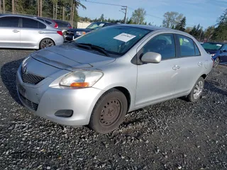 2009 Toyota Yaris with VIN JTDBT903194041550, listed as a IAAI auction lot 41993832 with 214,544 mi miles. Bid and sale history available at carsss.com. Image 18.