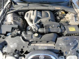 2005 Jaguar S-Type with VIN SAJWA01T55FN14254, listed as a Copart auction lot 86994974 with 126,484 mi miles and Salvage Title. Bid and sale history available at DreamBid. Image 11.