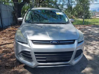 2014 Ford Escape SE with VIN 1FMCU9GX9EUD13214, listed as a IAAI auction lot 41973339 with 172,845 mi miles. Bid and sale history available at carsss.com. Image 6.